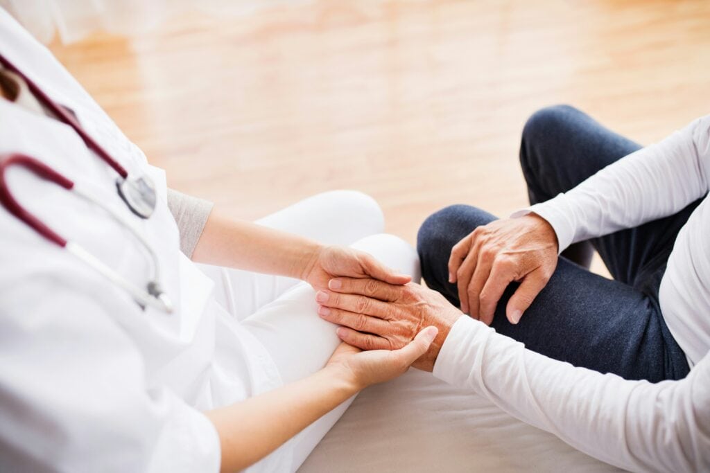 doctor holding patients hand wildwood opens